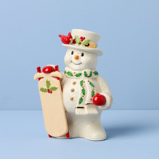 Figurine Bonhomme de neige avec traîneau 2025