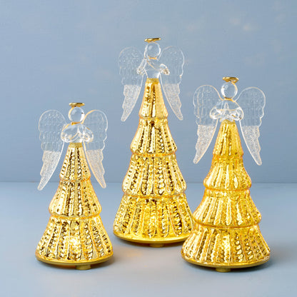 Ensemble de 3 figurines d'anges illuminées par une lumière radieuse