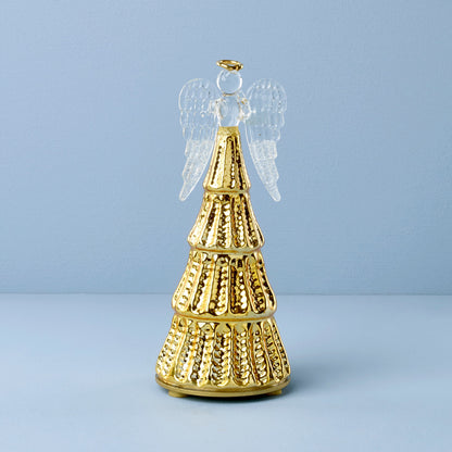 Figurine d'ange illuminée par une lumière rayonnante